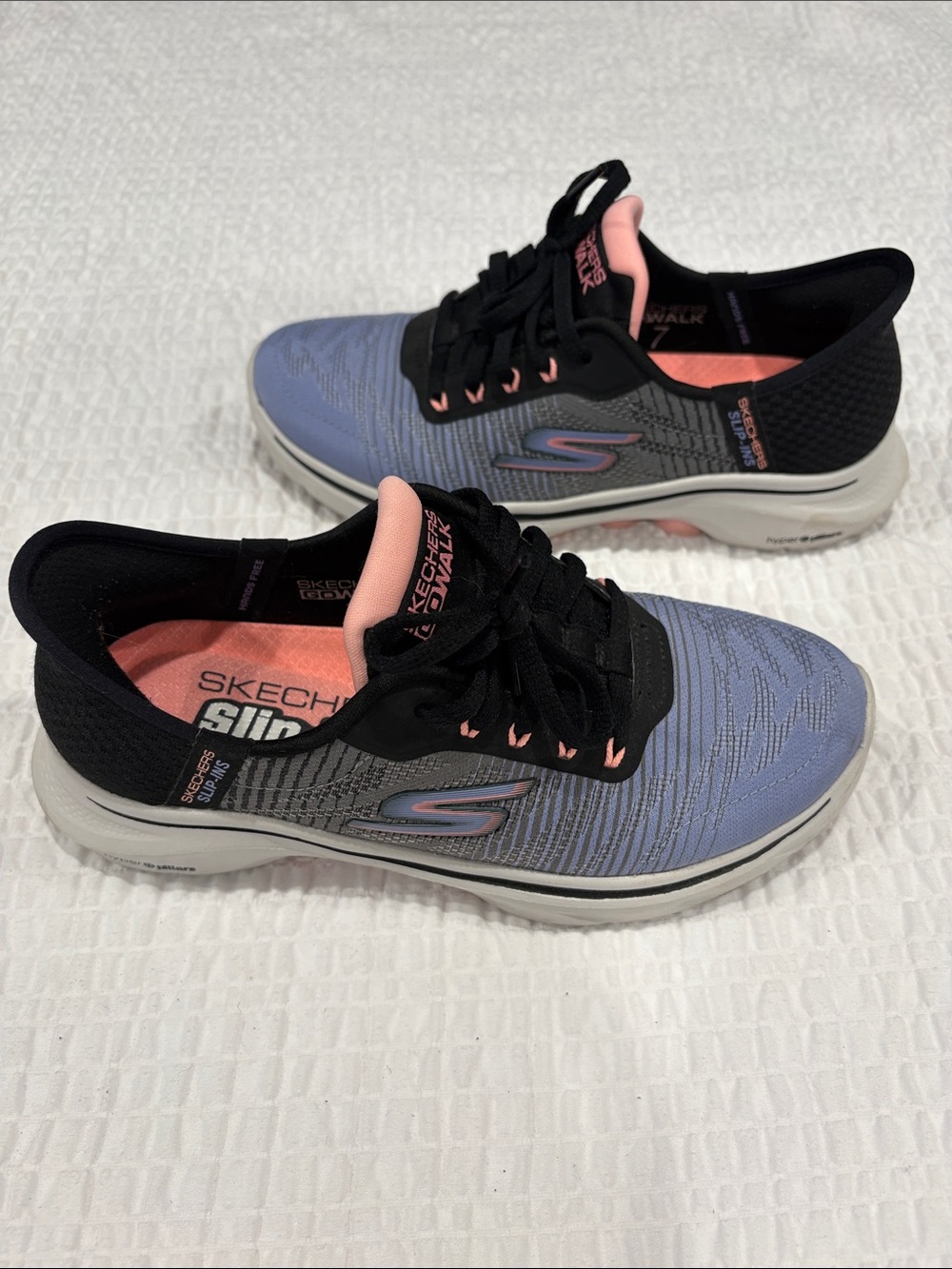 Skechers Light Blue Knit Adele Walking Shoes with Black and Pink Accents
Size 5